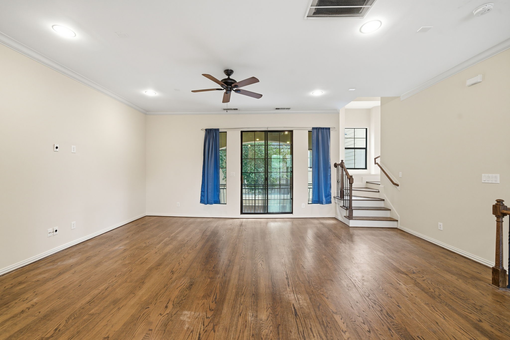 5310 Larkin Street, Unit B Houston, TX 77007 - Photo 6 of 36 a view of an empty room with wooden floor and a window