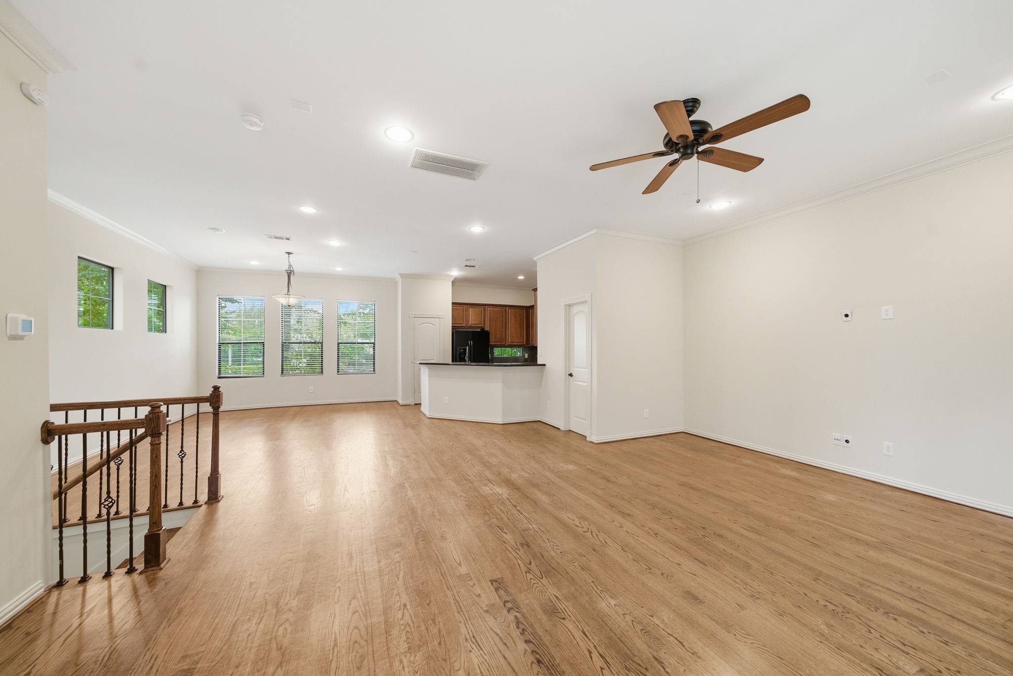 5310 Larkin Street, Unit B Houston, TX 77007 - Photo 9 of 36 a view of empty room with wooden floor and window