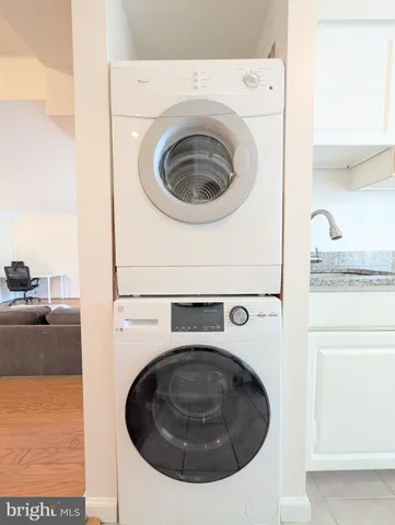 a utility room with dryer and washer