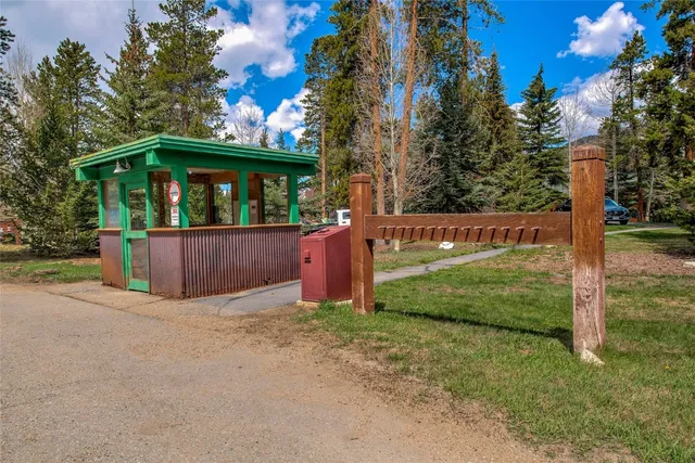 a view of a deck with a yard