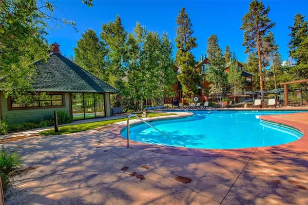 a view of outdoor space with swimming pool