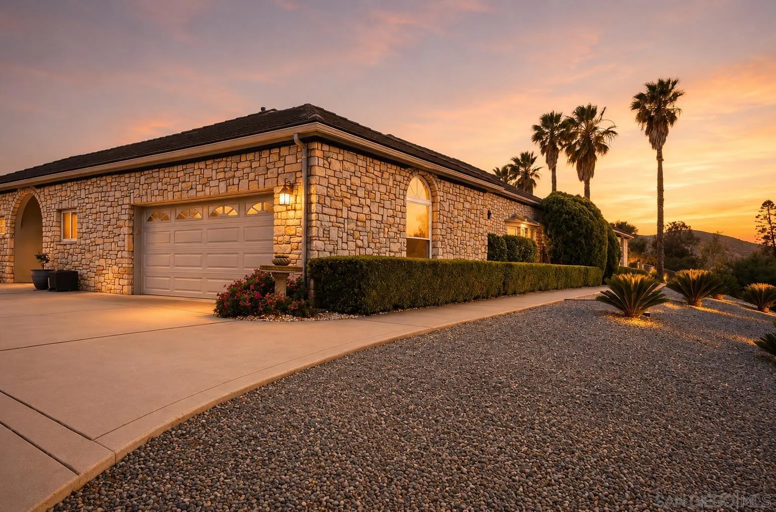 10015 El Capitan Real Road El Cajon, CA 92021 - Photo 3 of 58 a front view of a house with a yard