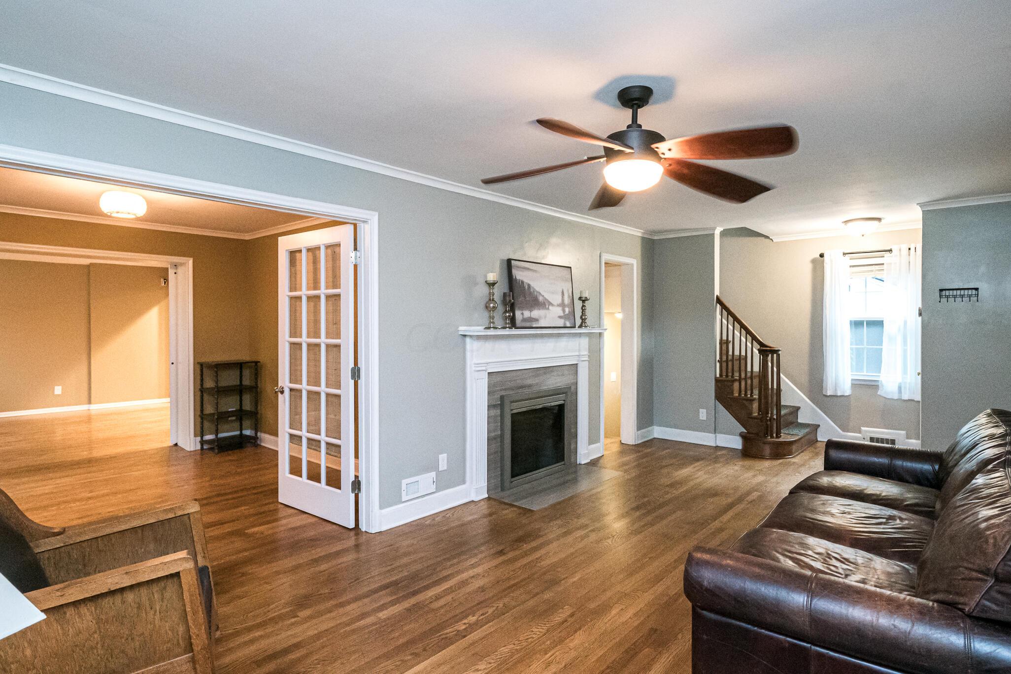356 Gudrun Road Columbus, OH 43202 - Photo 4 of 53 Living Room wit Fireplace, French doors to office