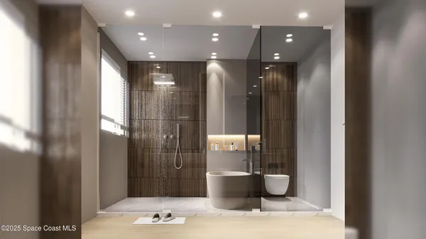 a view of a bathroom and a potted plant