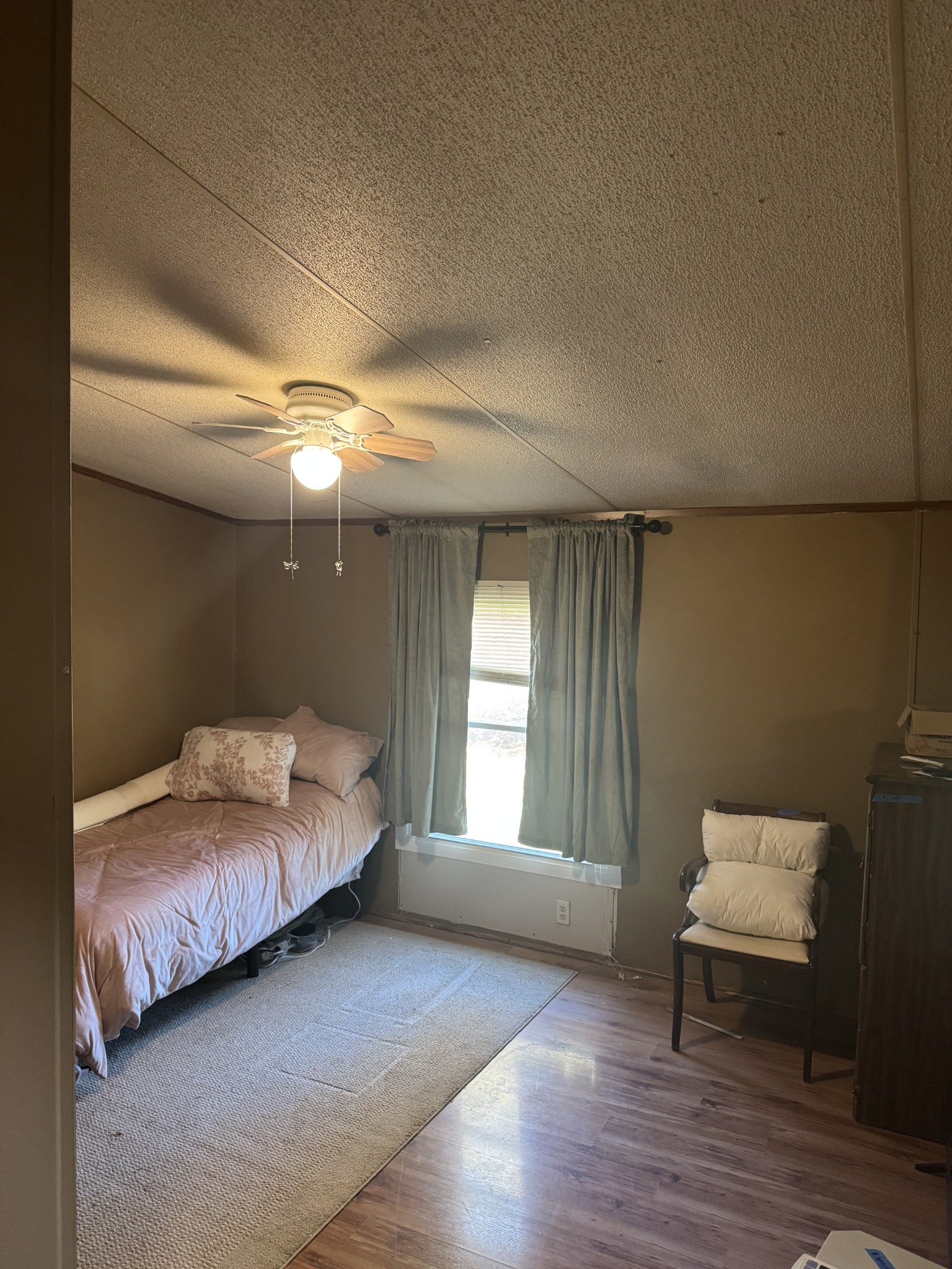 1195 Leo Baker Road Ashland City, TN 37015 - Photo 5 of 7 a bedroom with a bed and a window