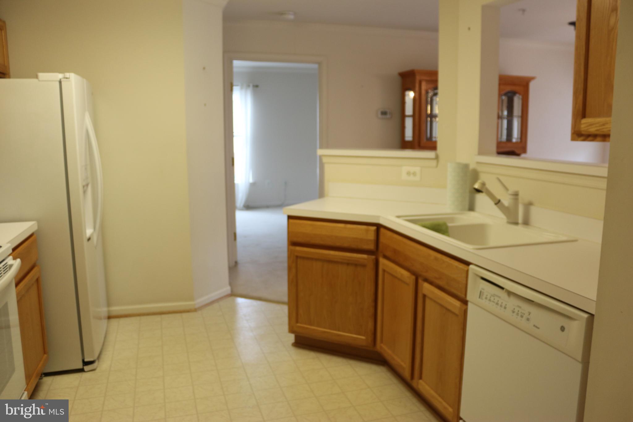 500 Patton Circle, Unit 7H Frederick, MD 21703 - Photo 6 of 13 a bathroom with a sink and a mirror