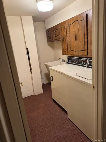 a view of a utility room with washer and dryer