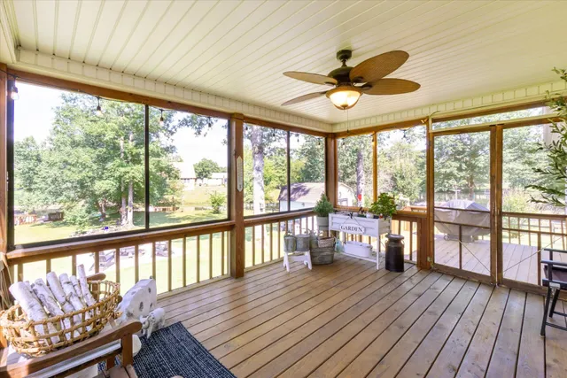 a view of a balcony with wooden floor