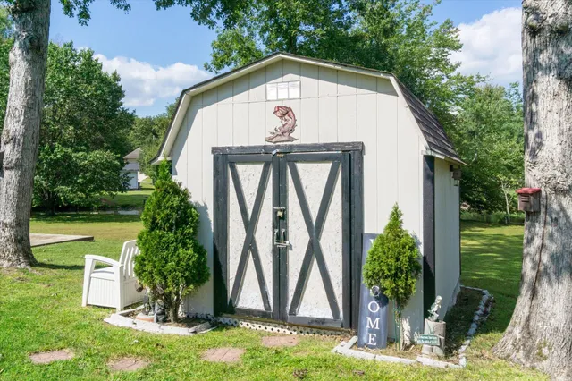 a front view of house with garden