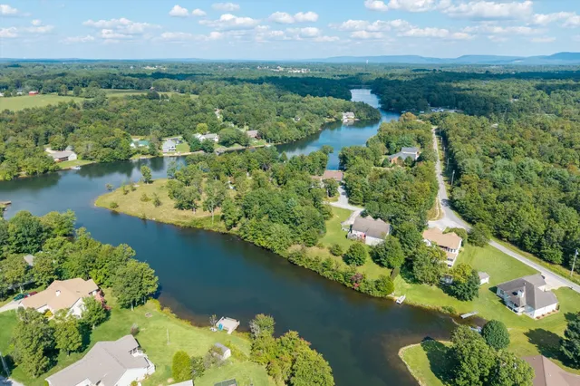 a view of a lake with a city