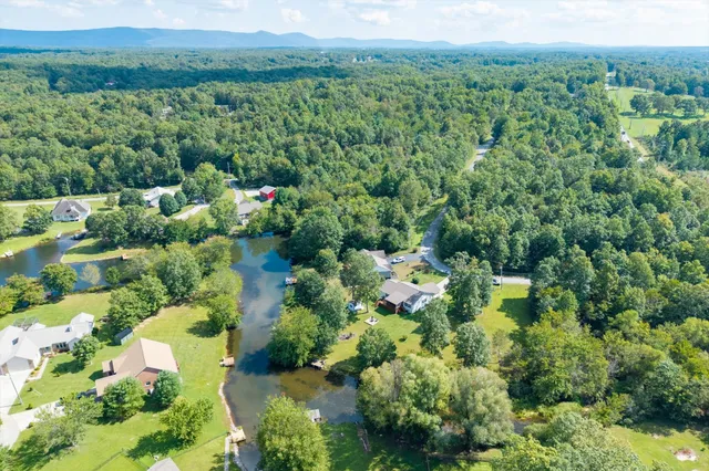 a view of a lake with a house
