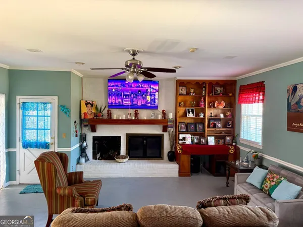 a view of a fireplace with many windows