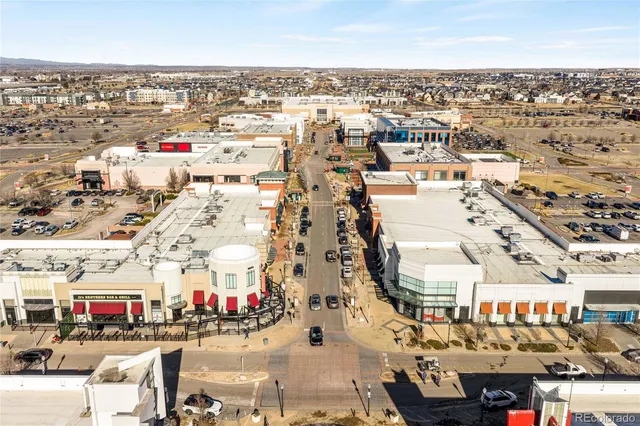 an aerial view of a house with a floor to ceiling window
