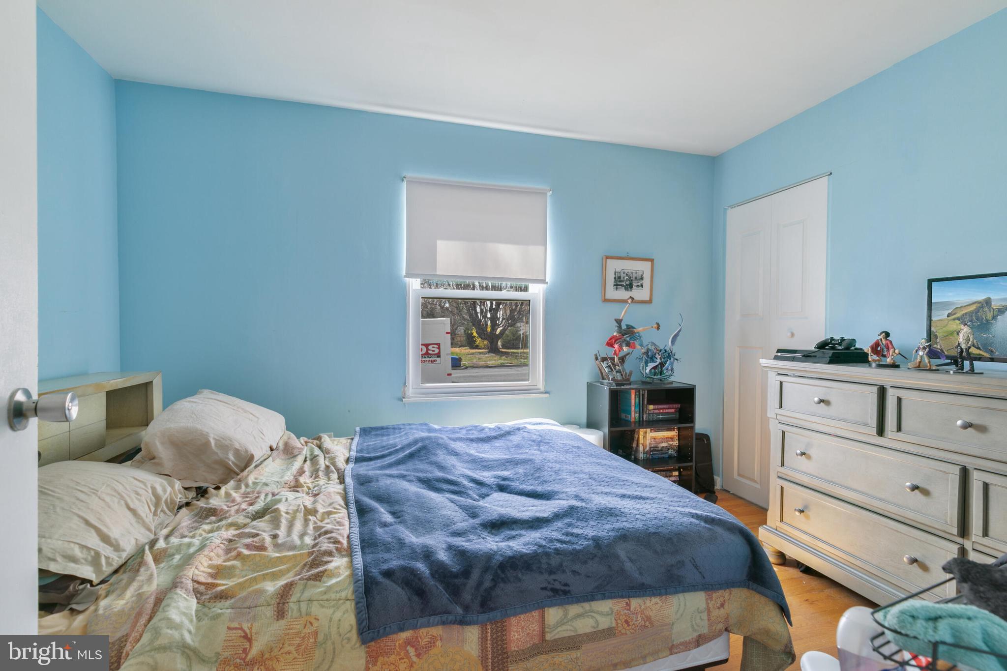 540 Eagle Place Winchester, VA 22601 - Photo 14 of 24 a bedroom with a bed and a dresser in it