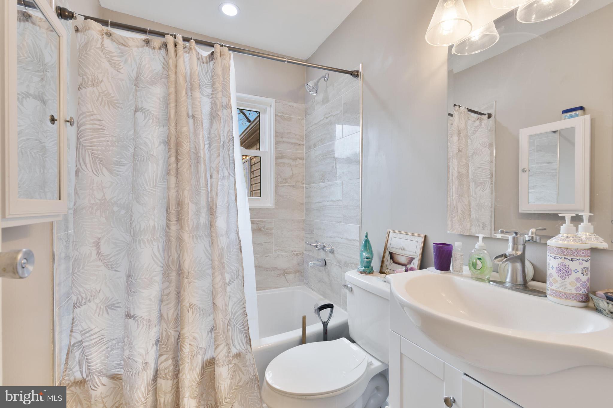 540 Eagle Place Winchester, VA 22601 - Photo 15 of 24 a bathroom with a sink toilet and shower