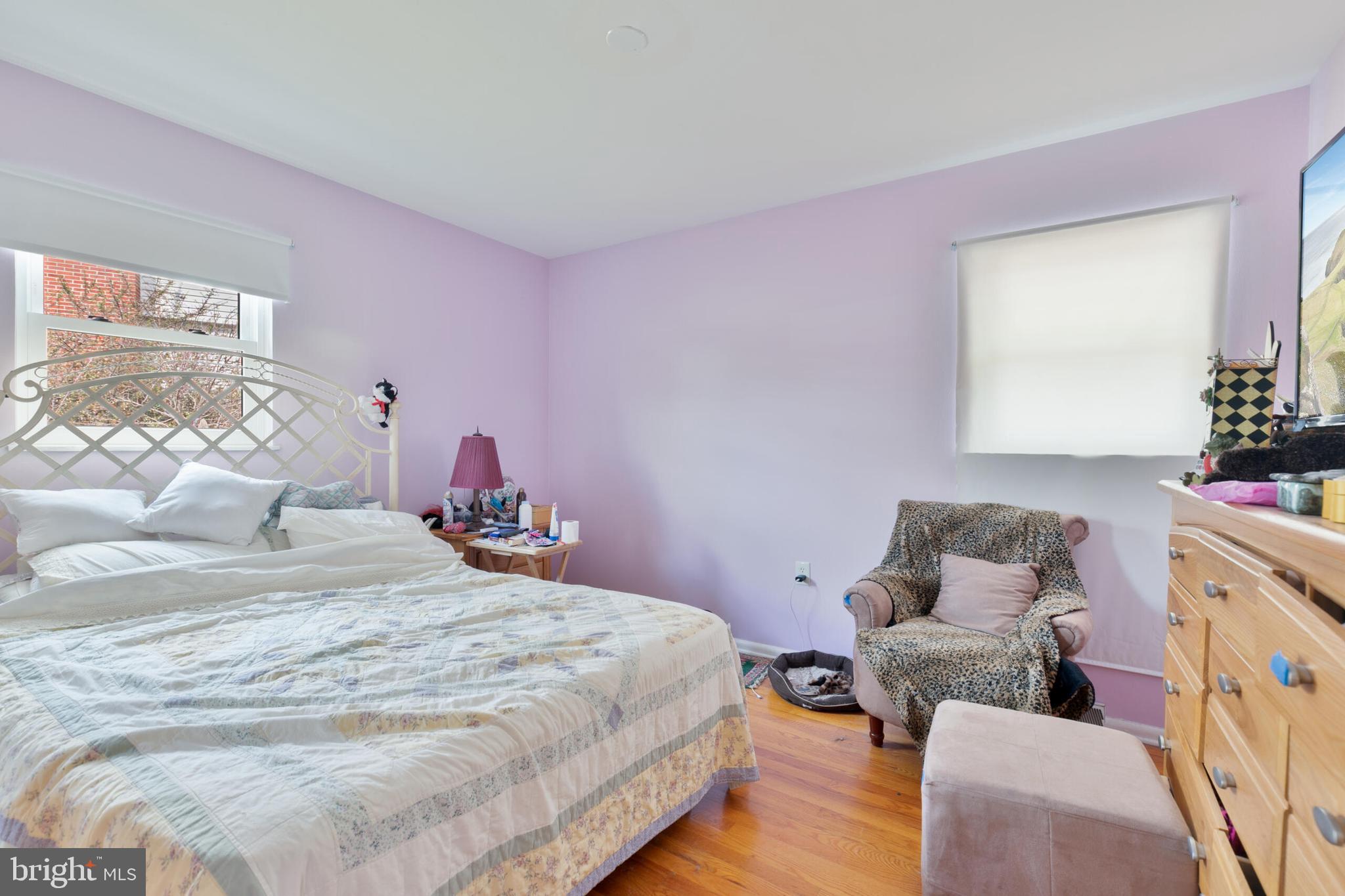 540 Eagle Place Winchester, VA 22601 - Photo 16 of 24 a bedroom with a bed and wooden floor