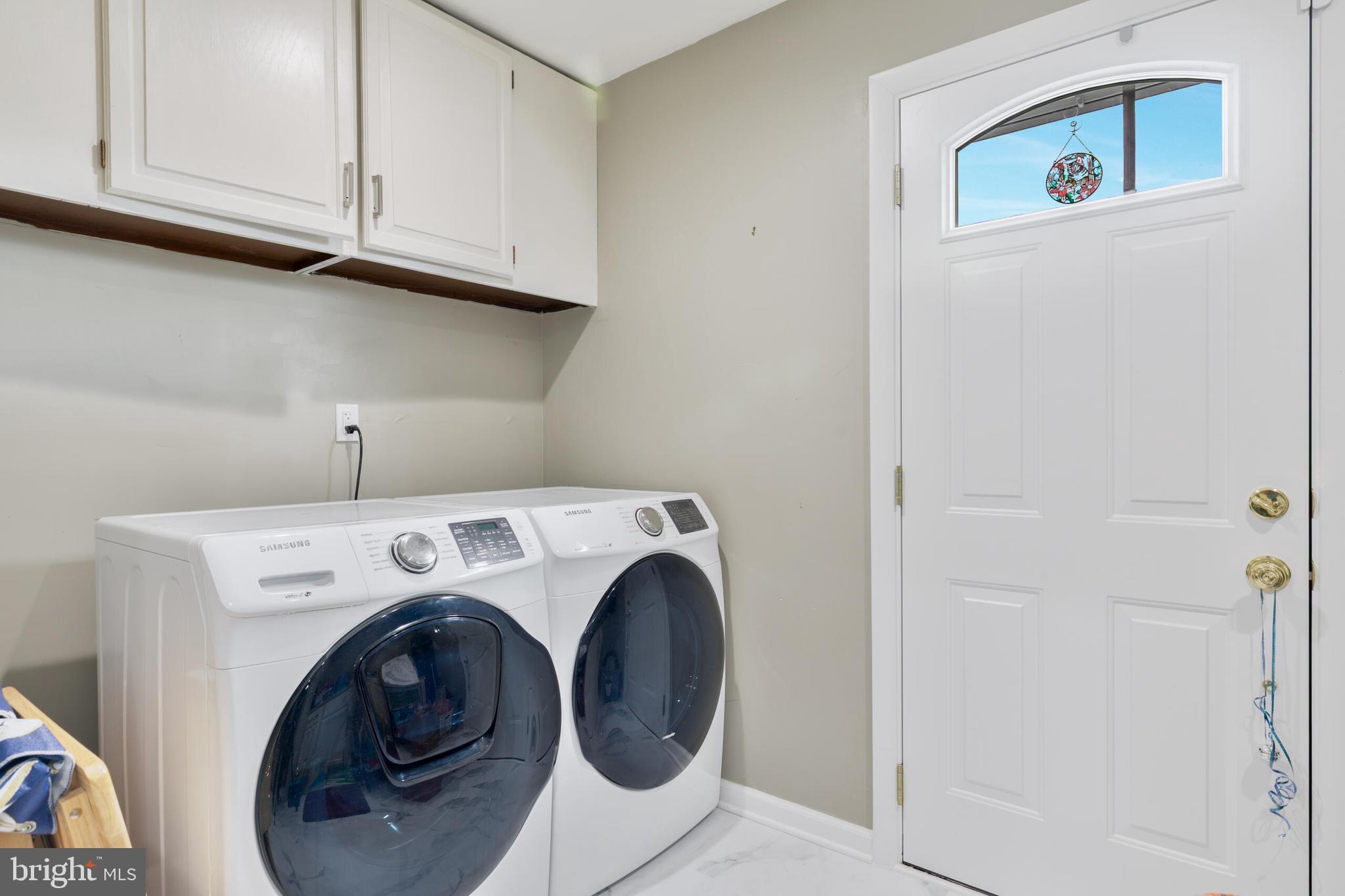 540 Eagle Place Winchester, VA 22601 - Photo 9 of 24 a utility room with dryer and washer
