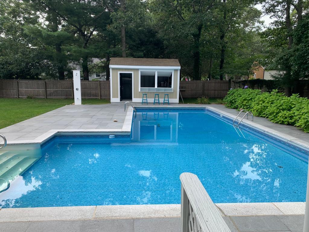 138 Lumbert Mill Road Centerville, MA 02632 - Photo 25 of 29 a view of house with swimming pool outdoor seating