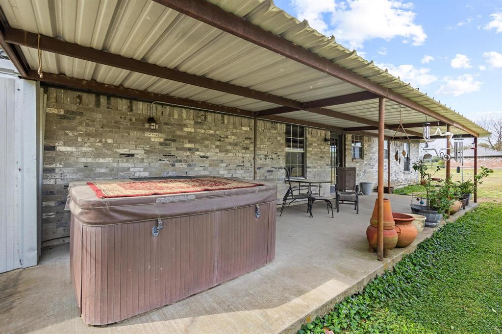 472 Milton-Minter Road Deport, TX 75435 - Photo 23 of 30 a view of swimming pool with outdoor seating