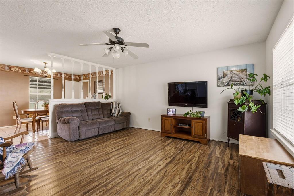 472 Milton-Minter Road Deport, TX 75435 - Photo 4 of 30 a living room with furniture and a flat screen tv