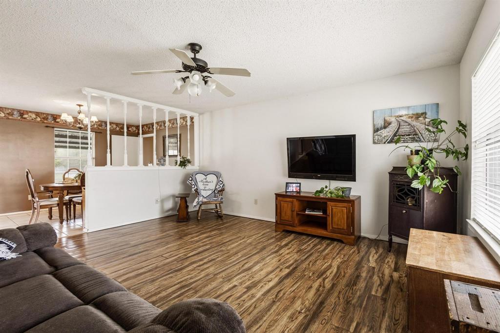 472 Milton-Minter Road Deport, TX 75435 - Photo 7 of 30 a living room with furniture and a flat screen tv