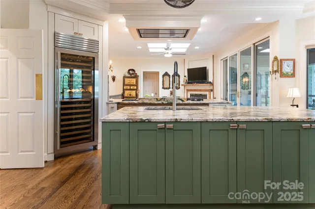 a bathroom with a sink and a large mirror