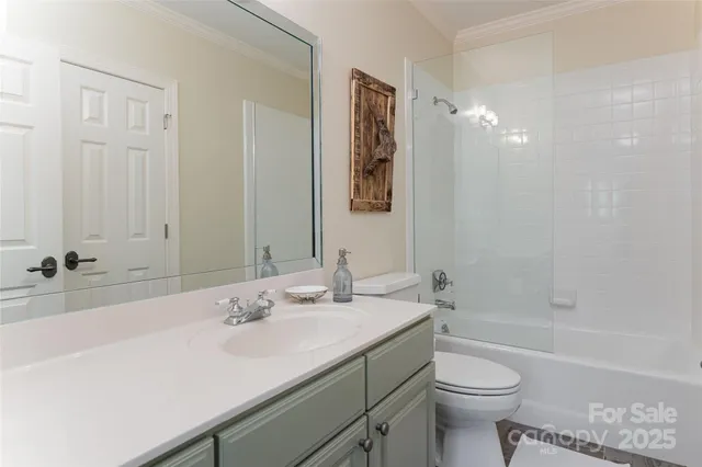 a view of a patio with a table chairs and wooden floor
