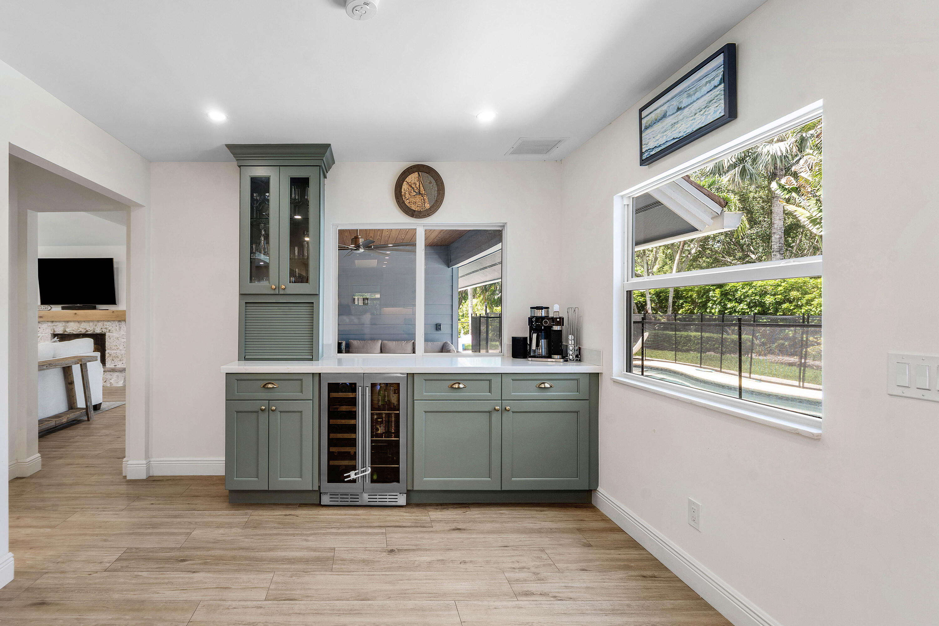 18770 Southeast River Ridge Road Jupiter, FL 33469 - Photo 5 of 34 Kitchen/pass thru/wine bar