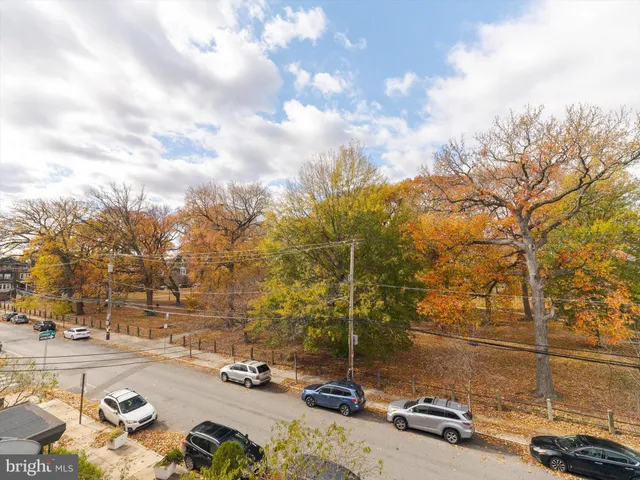 a view of a street with cars