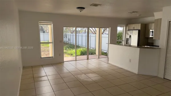 a view of an empty room and window