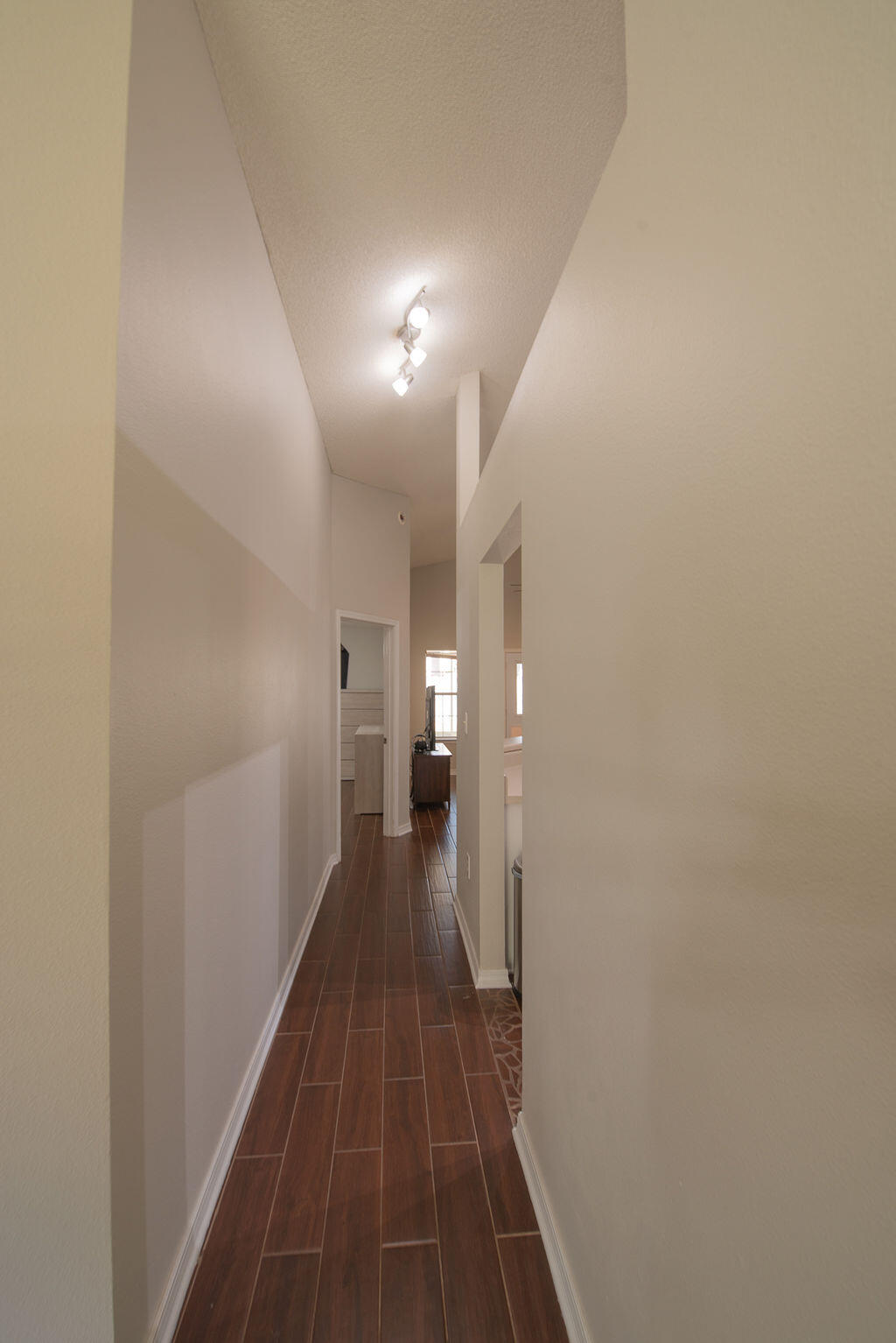 903 Lajolla Lane Mary Esther, FL 32569 - Photo 16 of 47 a view of a hallway with wooden floor
