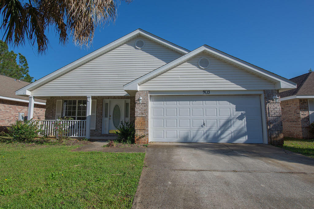903 Lajolla Lane Mary Esther, FL 32569 - Photo 2 of 47 a view of a house with backyard