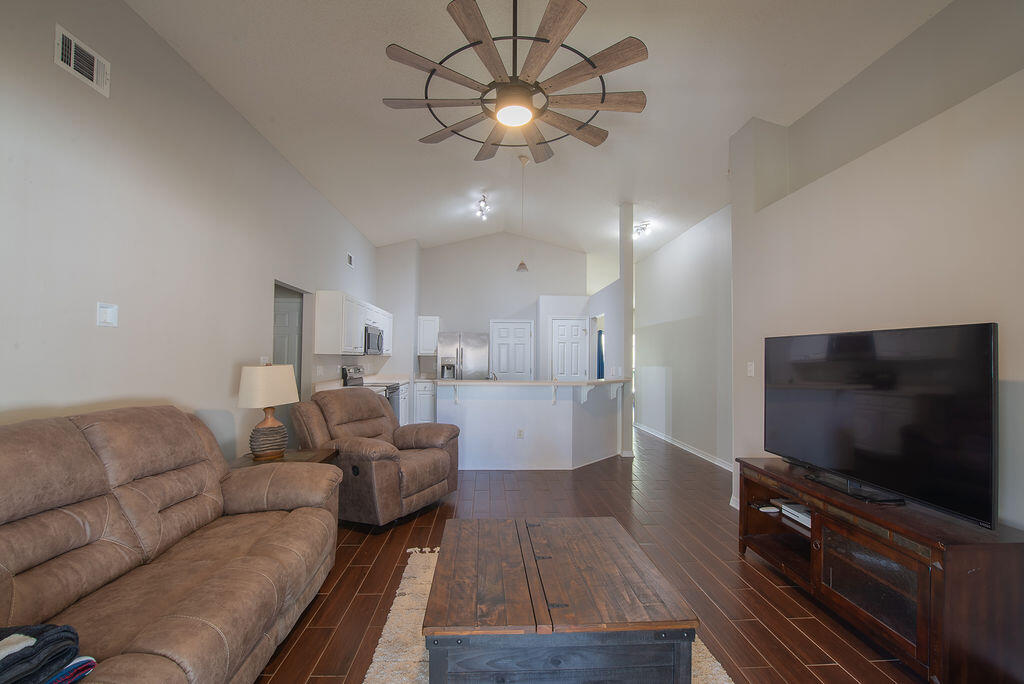 903 Lajolla Lane Mary Esther, FL 32569 - Photo 22 of 47 a living room with furniture and a flat screen tv
