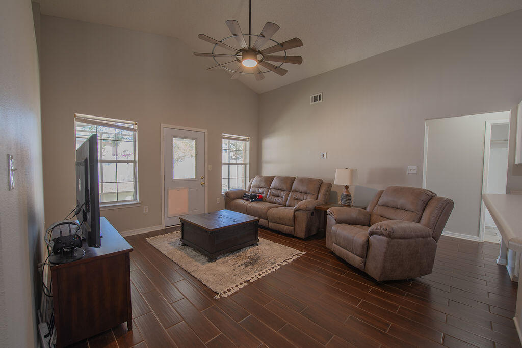 903 Lajolla Lane Mary Esther, FL 32569 - Photo 24 of 47 a living room with furniture and wooden floor