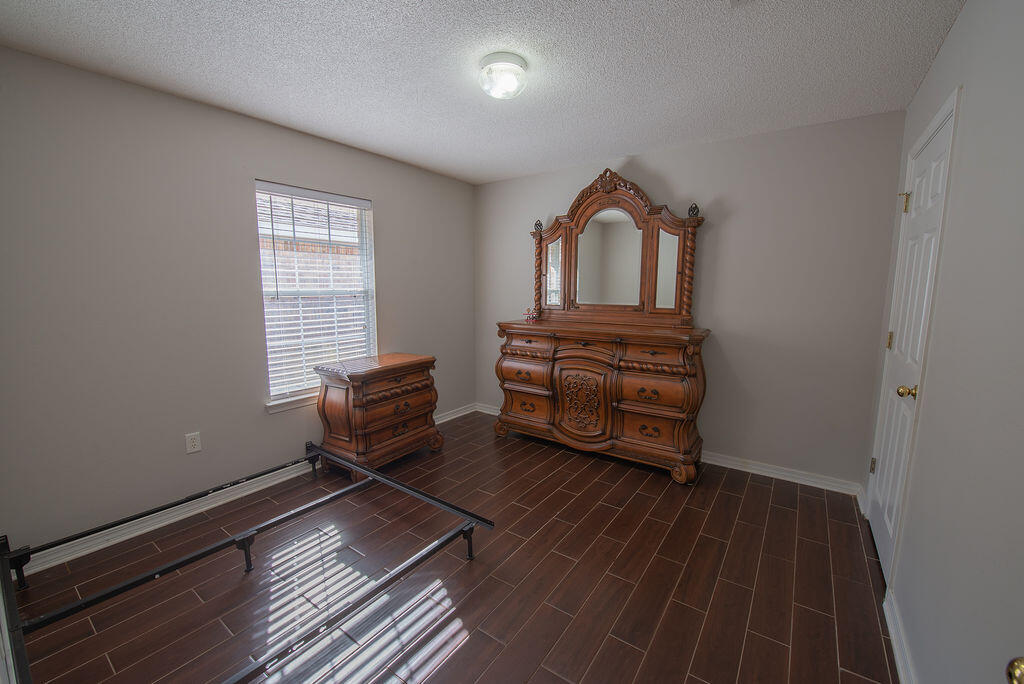 903 Lajolla Lane Mary Esther, FL 32569 - Photo 37 of 47 a living room with furniture and a wooden floor