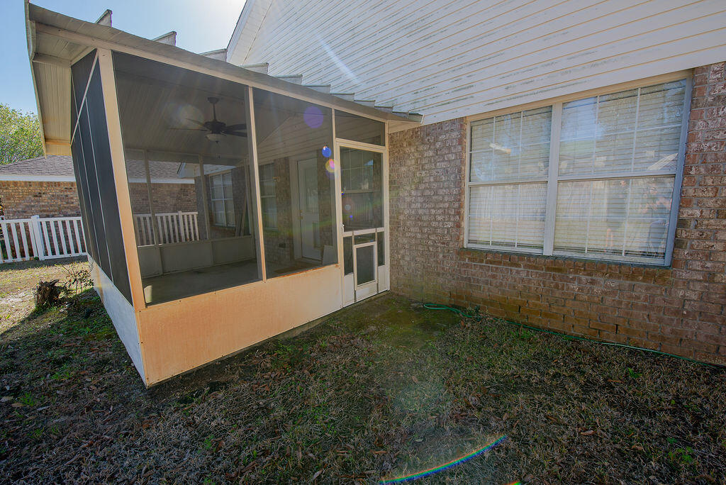 903 Lajolla Lane Mary Esther, FL 32569 - Photo 45 of 47 a backyard of a house