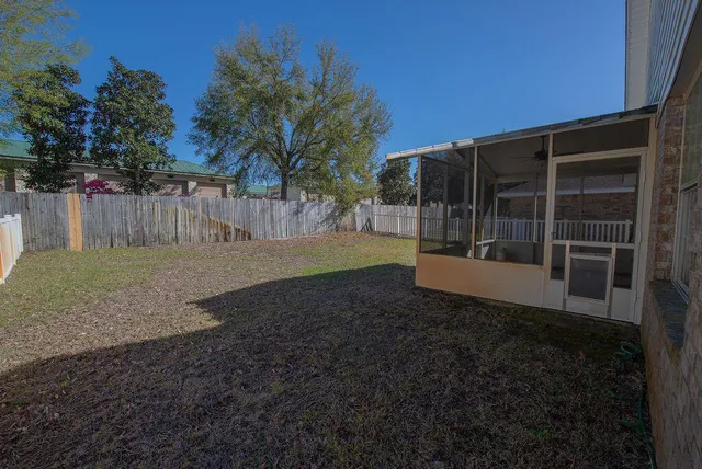 a view of a back yard of the house