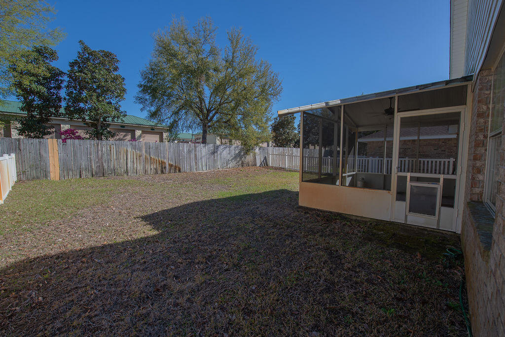 903 Lajolla Lane Mary Esther, FL 32569 - Photo 46 of 47 a view of a back yard of the house