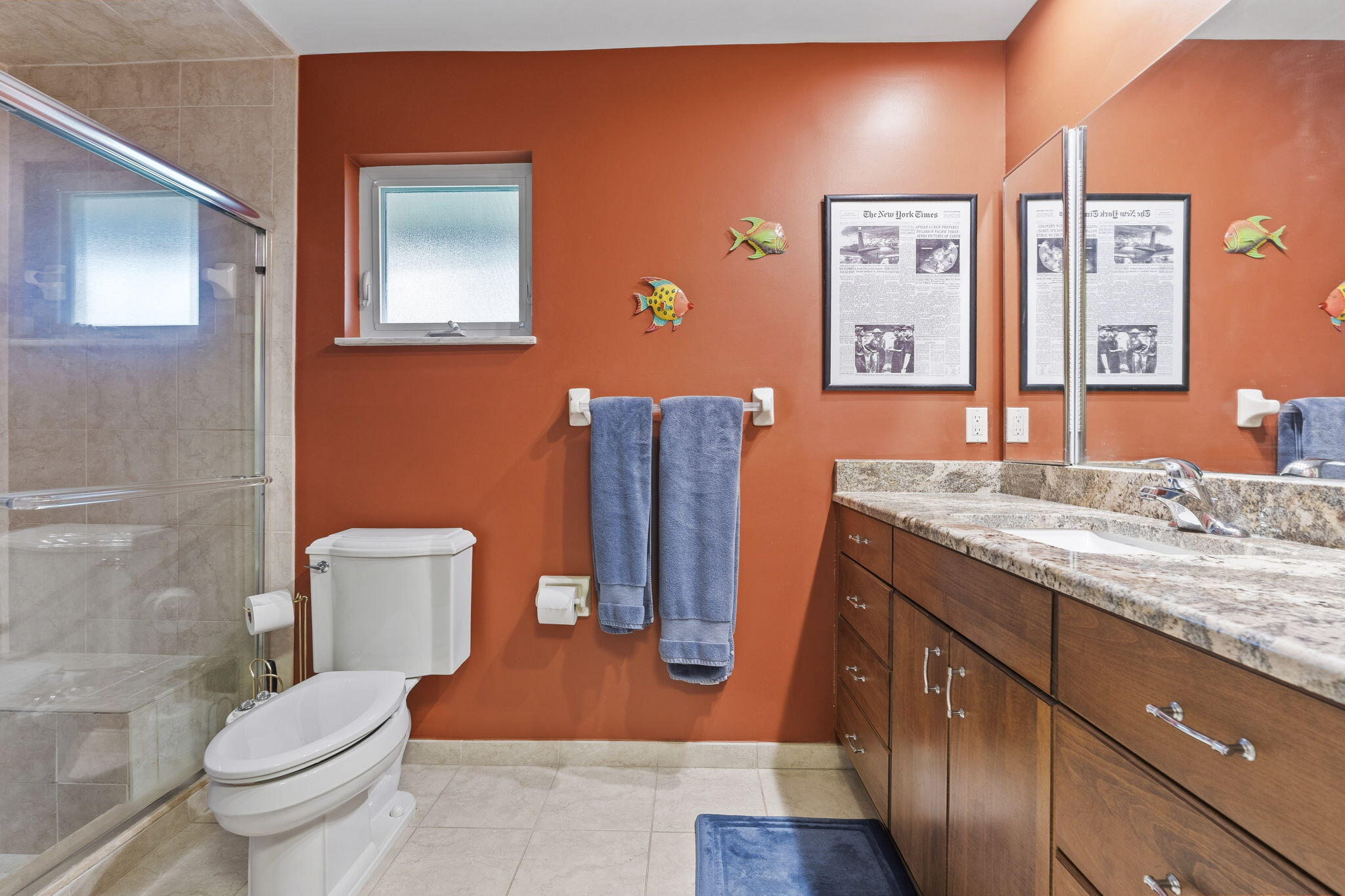 3374 Southeast Fairway East Stuart, FL 34997 - Photo 23 of 65 a bathroom with a granite countertop toilet sink and mirror