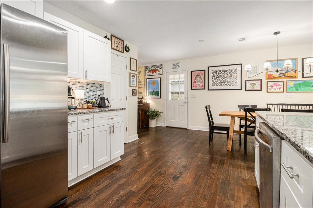 1347 Dorothy Drive Decatur, GA 30030 - Photo 12 of 38 a kitchen with cabinets and wooden floor