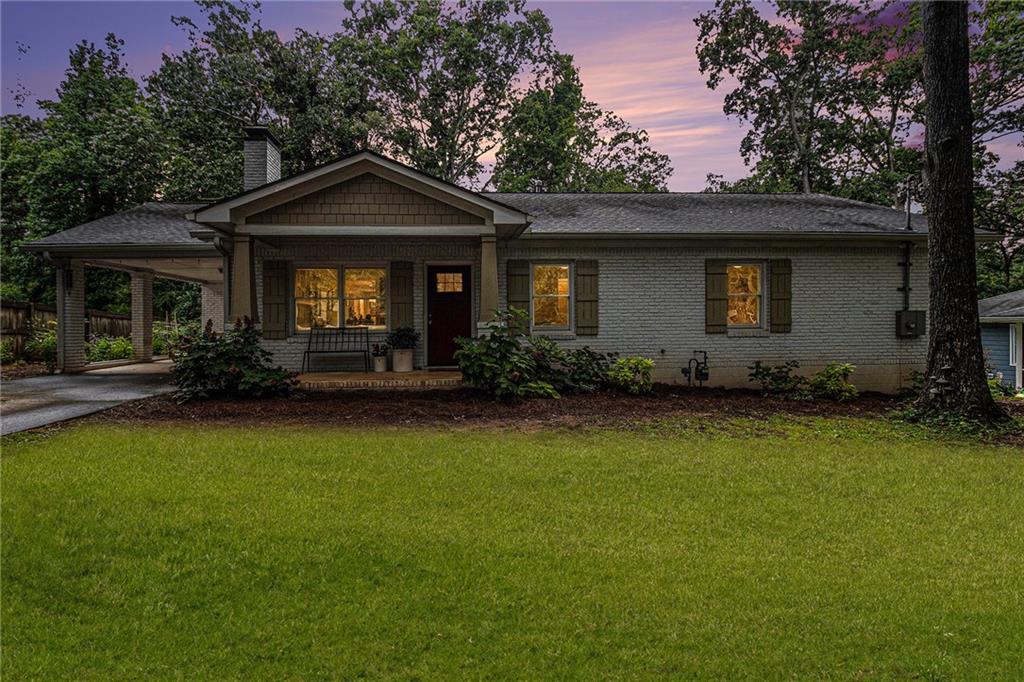1347 Dorothy Drive Decatur, GA 30030 - Photo 3 of 38 a front view of a house with garden