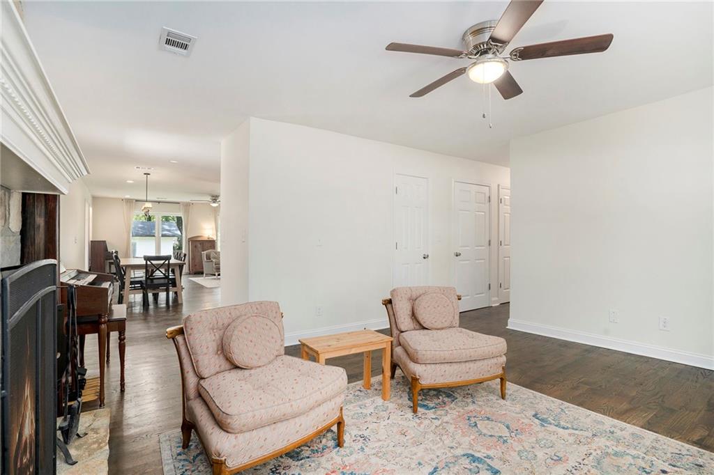 1347 Dorothy Drive Decatur, GA 30030 - Photo 7 of 38 a living room with furniture a rug and a ceiling fan