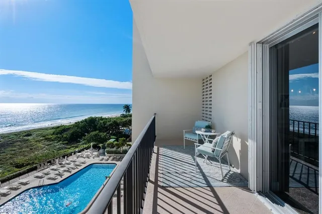 a view of balcony with furniture