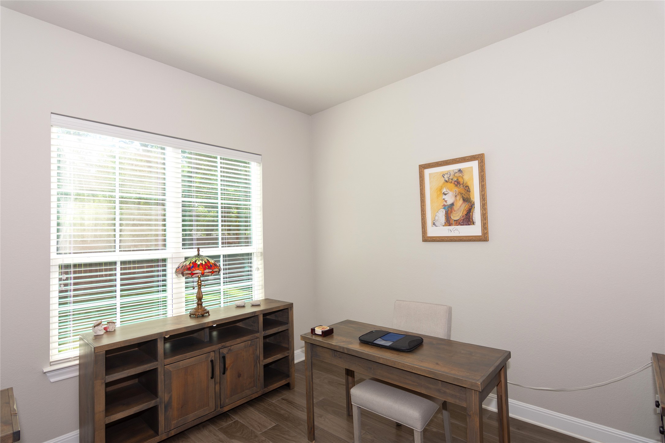 4733 Collins Street, Unit 610 Round Rock, TX 78628 - Photo 16 of 36 a view of a workspace with furniture and a window