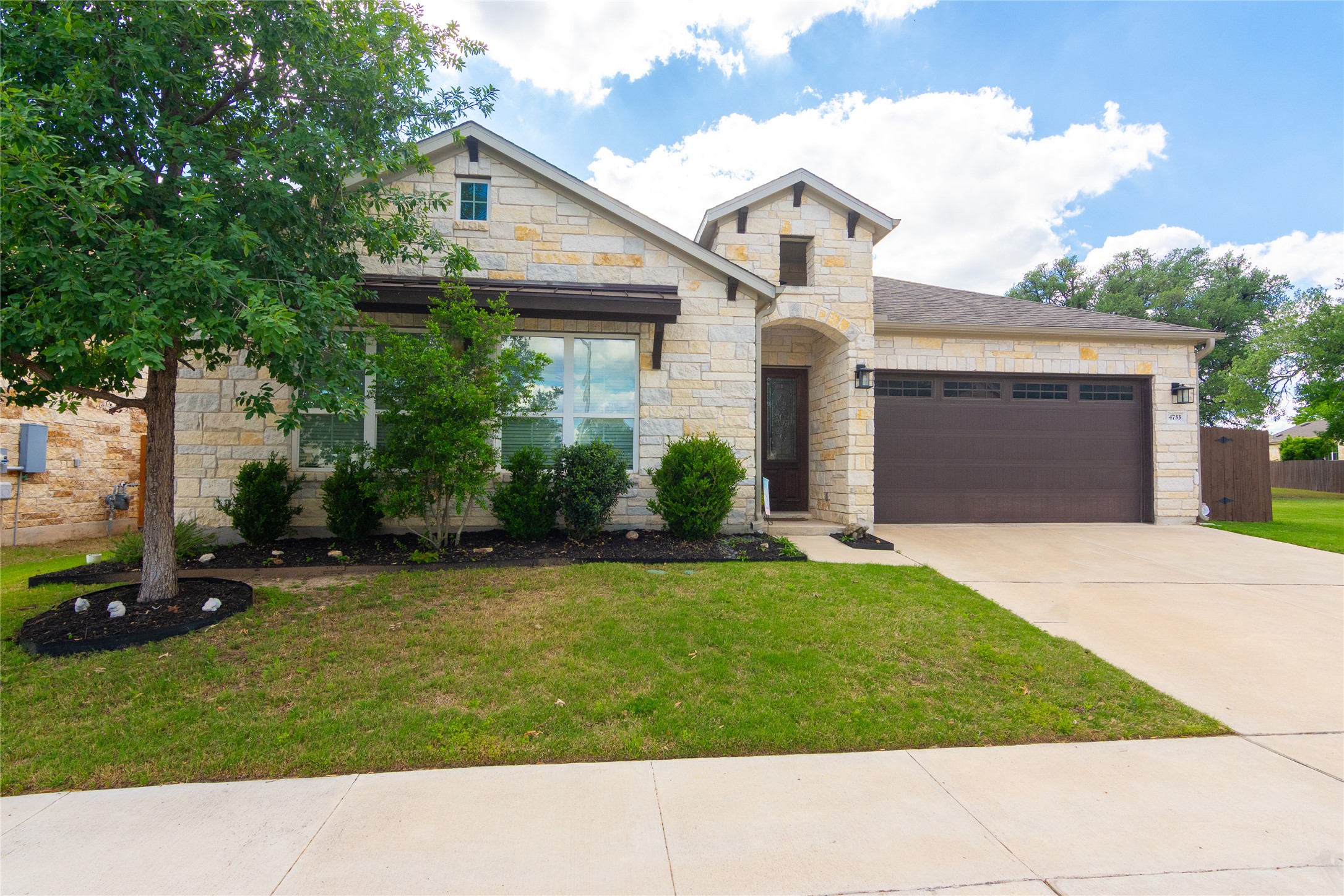 4733 Collins Street, Unit 610 Round Rock, TX 78628 - Photo 2 of 36 a house view with a outdoor space