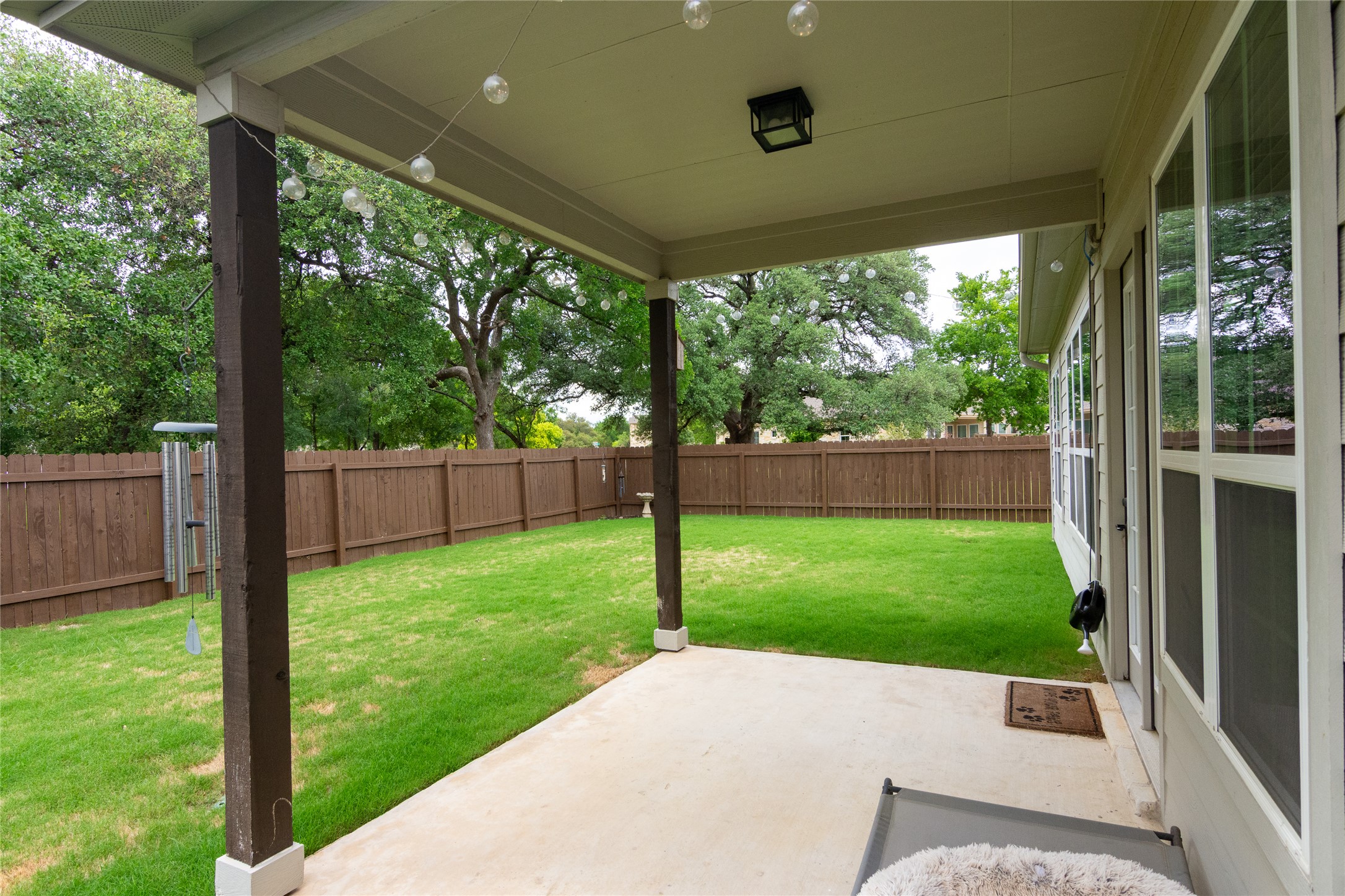 4733 Collins Street, Unit 610 Round Rock, TX 78628 - Photo 30 of 36 a view of a porch with a backyard