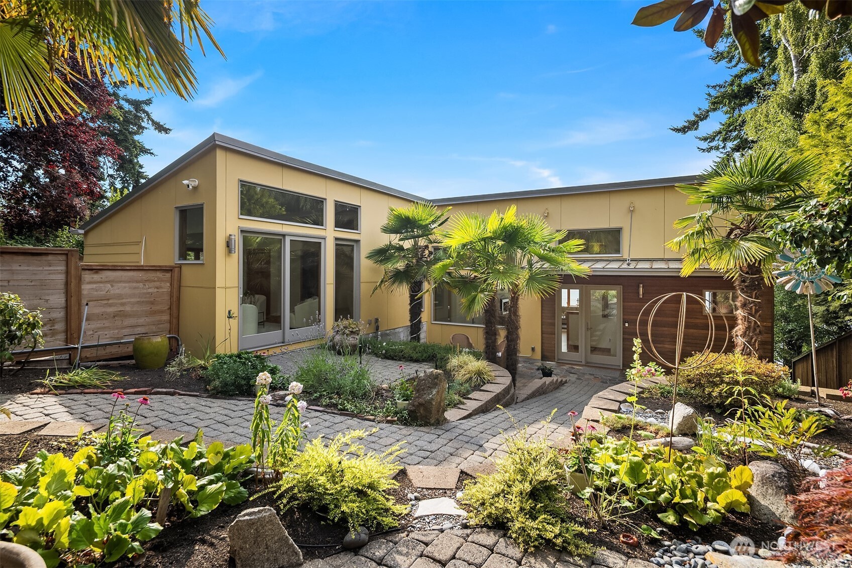 16947 Maplewild Avenue Southwest Burien, WA 98166 - Photo 2 of 23 a view of a house with a yard