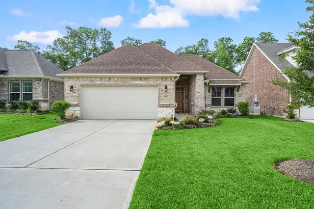 $395,000 | 12117 Creekside Villas Court, Conroe, TX 77304
