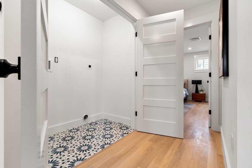 136 Wright Street Arlington, MA 02474 - Photo 18 of 38 a view of walk in closet with empty racks