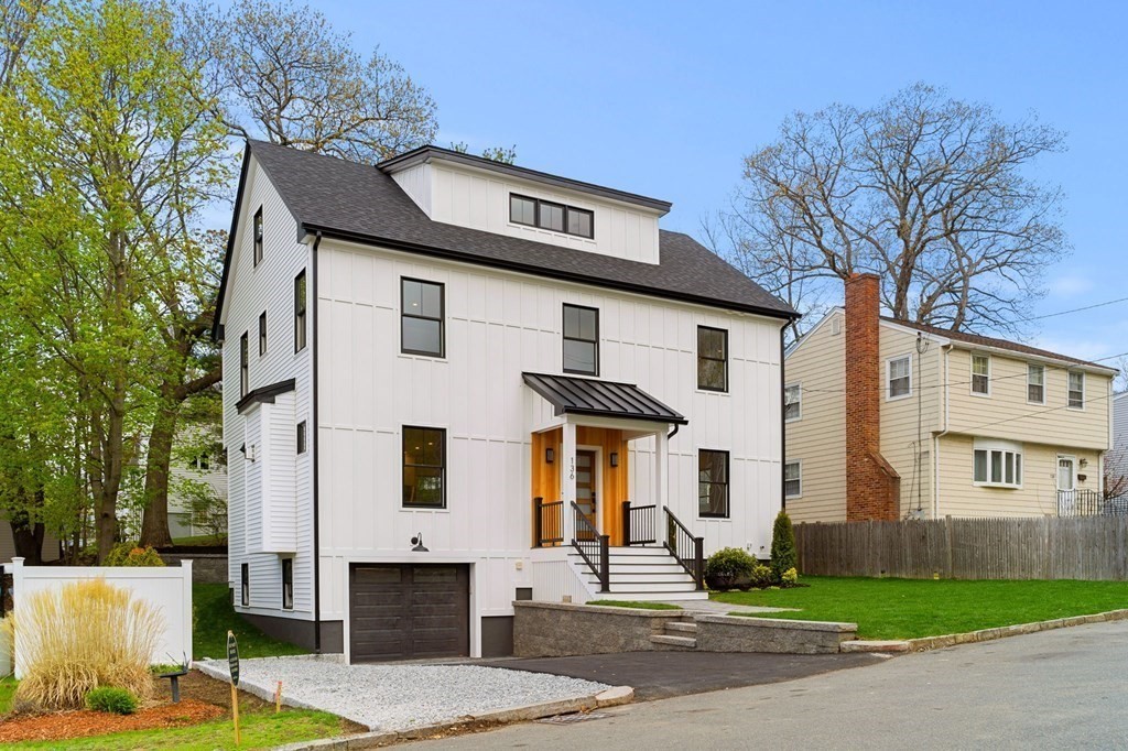 136 Wright Street Arlington, MA 02474 - Photo 36 of 38 a front view of a house with garden